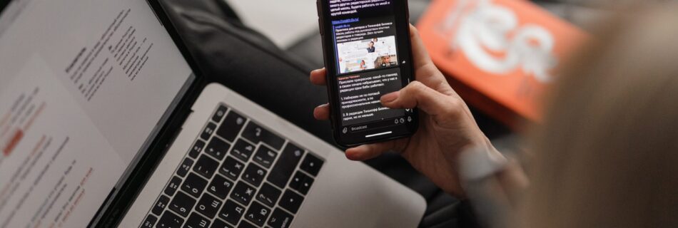 person holding black iphone 4